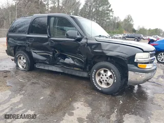 2003 Chevrolet Tahoe LS with VIN 1GNEC13Z73R243308, listed as a IAAI auction lot 41510266 with 246,378 mi miles. Bid and sale history available at carsss.com. Image 1.