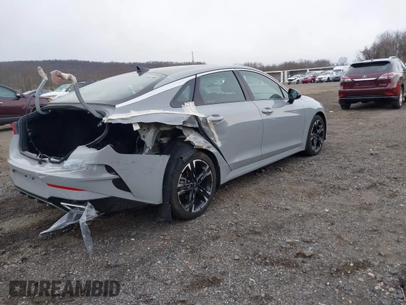 2024 Kia K5 GT-Line z VIN 5XXG64J22RG228095, wystawiony jako IAAI lot #41888510 z przebiegiem 11 927 mil mil oraz . Historia ofert i sprzedaży dostępna na DreamBid. Obrazek 4.