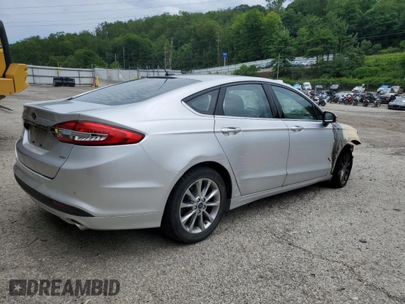 2017 Ford Fusion SE z VIN 3FA6P0H72HR394609, wystawiony jako Copart lot #63386525 z przebiegiem Nie podano mil oraz Szkoda całkowita • Salvage title. Historia ofert i sprzedaży dostępna na DreamBid. Obrazek 3.