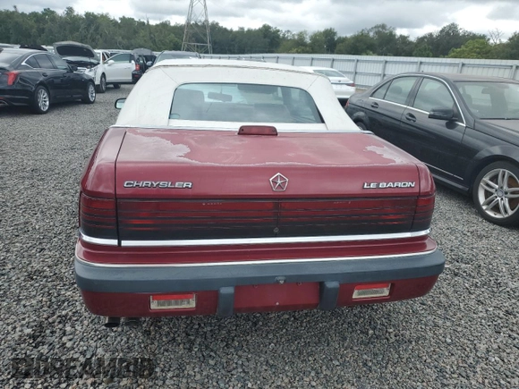 1989 Chrysler LeBaron z VIN 1C3XJ45J8KG223051, wystawiony jako Copart lot #75115464 z przebiegiem 27 923 mil mil oraz Szkody całkowita. Historia ofert i sprzedaży dostępna na DreamBid. Obrazek 6.