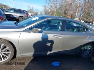 2020 Lexus ES with VIN 58ADZ1B13LU073464, listed as a IAAI auction lot 41195303 with 57,991 mi miles. Bid and sale history available at carsss.com. Image 14.