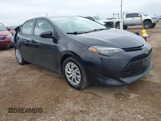 2019 Toyota Corolla L z VIN 5YFBURHE8KP913339, wystawiony jako IAAI lot #42202539 z przebiegiem 69 988 mil mil oraz . Historia ofert i sprzedaży dostępna na DreamBid. Obrazek 1.