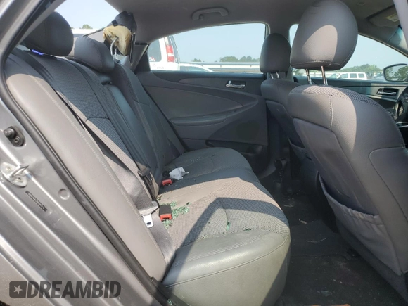 2013 Hyundai Sonata SE z VIN 5NPEC4AC2DH557370, wystawiony jako Copart lot #59120895 z przebiegiem 180 932 mil mil oraz Szkoda całkowita • Salvage title. Historia ofert i sprzedaży dostępna na DreamBid. Obrazek 10.