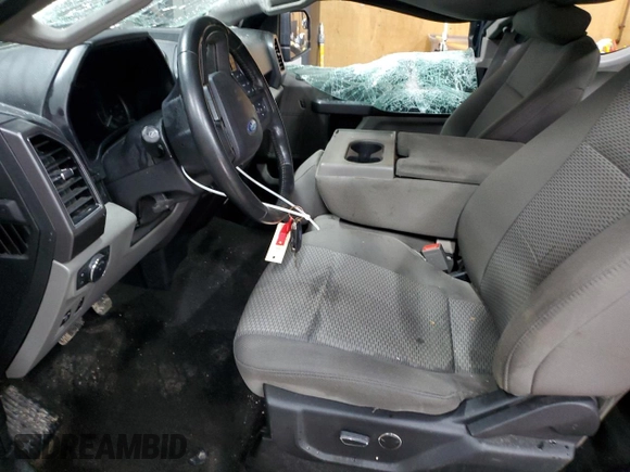 2018 Ford F-150 XL with VIN 1FTFX1E57JFE75983, listed as a Copart auction lot 52619685 with 184,124 mi miles and Clean title. Bid and sale history available at DreamBid. Image 7.