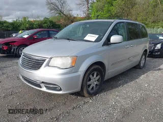 2011 Chrysler Town & Country Touring with VIN 2A4RR5DG4BR682109, listed as a IAAI auction lot 42189832 with 208,709 mi miles and . Bid and sale history available at DreamBid. Image 2.