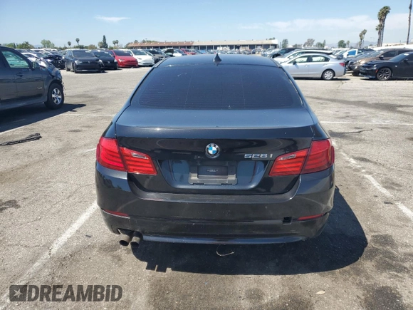 2013 BMW 5 Series 528i with VIN WBAXG5C59DDY35556, listed as a Copart auction lot 52978635 with 101,376 mi miles and Clean Title. Bid and sale history available at carsss.com. Image 6.