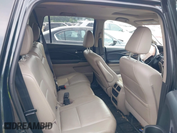 2016 Honda Pilot EX-L with VIN 5FNYF6H53GB070382, listed as a IAAI auction lot 39476567 with 83,741 mi miles and . Bid and sale history available at DreamBid. Image 8.