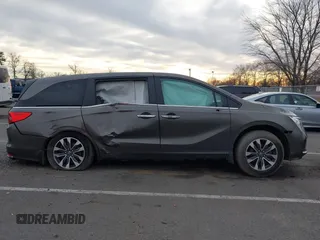 2022 Honda Odyssey EX-L z VIN 5FNRL6H7XNB061495, wystawiony jako IAAI lot #41093391 z przebiegiem 50 572 mil mil oraz . Historia ofert i sprzedaży dostępna na DreamBid. Obrazek 13.