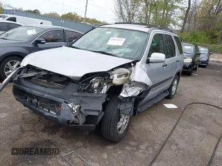 2003 Honda CR-V EX with VIN SHSRD78853U142437, listed as a IAAI auction lot 42015819 with 217,410 mi miles and . Bid and sale history available at carsss.com. Image 2.