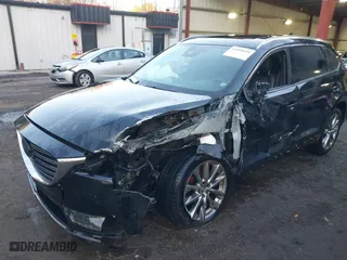 2018 Mazda CX-9 Grand Touring with VIN JM3TCBDY1J0226816, listed as a IAAI auction lot 41090655 with 99,320 mi miles. Bid and sale history available at carsss.com. Image 6.