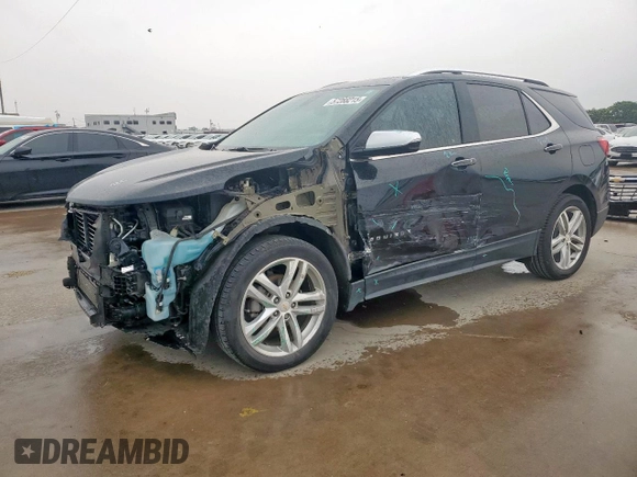 2021 Chevrolet Equinox Premier z VIN 2GNAXNEV9M6136701, wystawiony jako Copart lot #57288215 z przebiegiem 62 808 mil mil oraz Szkoda całkowita • Salvage title. Historia ofert i sprzedaży dostępna na DreamBid. Obrazek 1.