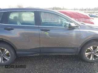 2018 Honda CR-V LX z VIN 2HKRW6H34JH202657, wystawiony jako IAAI lot #41568088 z przebiegiem Nie podano mil oraz . Historia ofert i sprzedaży dostępna na DreamBid. Obrazek 12.