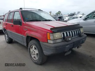 1995 Jeep Grand Cherokee Laredo with VIN 1J4FX58S7SC662775, listed as a IAAI auction lot 42750392 with 251,795 mi miles and . Bid and sale history available at DreamBid. Image 1.