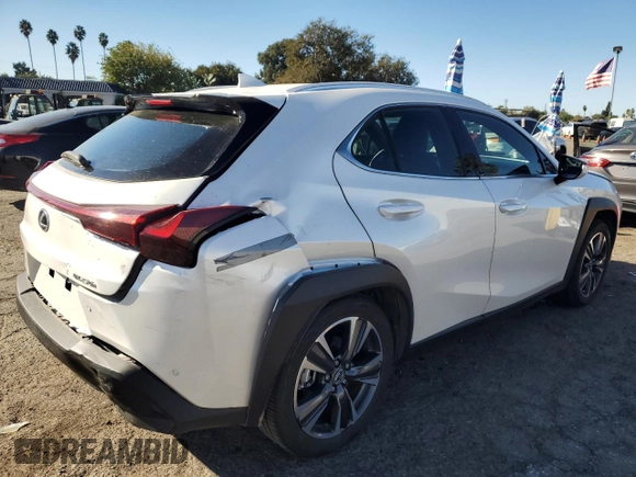 2024 Lexus UX with VIN JTHX6JBH0R2188086, listed as a Copart auction lot 79203964 with 7,703 mi miles and Salvage Title. Bid and sale history available at carsss.com. Image 3.