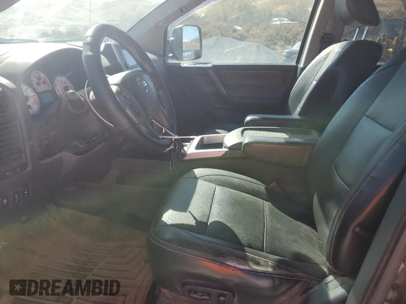 2014 Nissan Titan S with VIN 1N6AA0EC1EN510658, listed as a Copart auction lot 75210054 with Not Provided miles and Salvage Title. Bid and sale history available at DreamBid. Image 7.