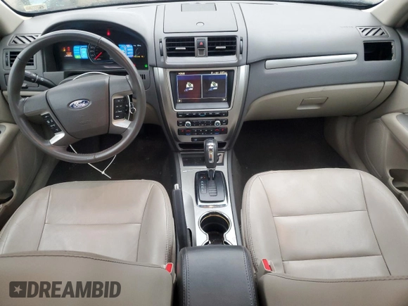 2012 Ford Fusion Hybrid z VIN 3FADP0L35CR425873, wystawiony jako Copart lot #50870905 z przebiegiem 75 133 mil mil oraz Szkoda całkowita • Salvage title. Historia ofert i sprzedaży dostępna na DreamBid. Obrazek 8.