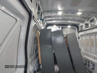 2017 Ford Transit Cargo with VIN 1FTBW3XG9HKA80524, listed as a IAAI auction lot 37520715 with 98,524 mi miles. Bid and sale history available at carsss.com. Image 8.