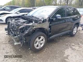 2019 Toyota RAV4 XLE with VIN 2T3W1RFV8KW001328, listed as a IAAI auction lot 41961320 with 100,678 mi miles and . Bid and sale history available at DreamBid. Image 2.
