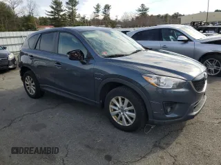 2013 Mazda CX-5 Touring with VIN JM3KE4CE2D0115012, listed as a Copart auction lot 49902355 with 239,562 mi miles and Salvage Title. Bid and sale history available at DreamBid. Image 4.