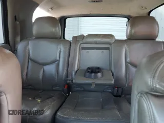 2003 GMC Yukon SLT z VIN 1GKEC13Z63J308578, wystawiony jako Copart lot #53270405 z przebiegiem 308 272 mil mil oraz Szkody całkowita. Historia ofert i sprzedaży dostępna na DreamBid. Obrazek 10.