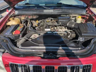 2004 Jeep Grand Cherokee Laredo with VIN 1J4GW48S54C363256, listed as a Copart auction lot 61862615 with 163,721 mi miles and Salvage title. Bid and sale history available at DreamBid. Image 11.
