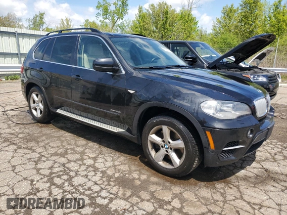 2013 BMW X5 xDrive50i with VIN 5UXZV8C56DL898864, listed as a Copart auction lot 56076705 with 157,805 mi miles and Clean title. Bid and sale history available at DreamBid. Image 4.