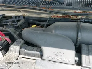 1999 Ford Econoline Cargo with VIN 1FTRE14W0XHC27388, listed as a IAAI auction lot 42398321 with 292,052 mi miles and . Bid and sale history available at DreamBid. Image 13.