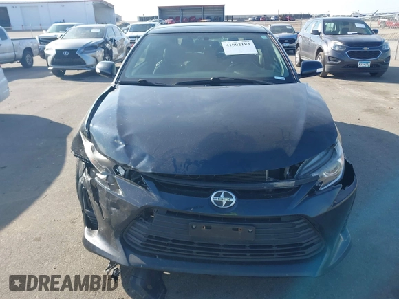 2015 Scion tC with VIN JTKJF5C71F3090963, listed as a IAAI auction lot 41802183 with 107,650 mi miles. Bid and sale history available at carsss.com. Image 12.