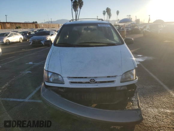 2000 Toyota Sienna LE with VIN 4T3ZF13CXYU184839, listed as a Copart auction lot 80035434 with 0 mi miles and Salvage Title. Bid and sale history available at carsss.com. Image 5.