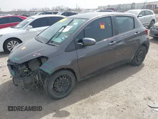 2015 Toyota Yaris L with VIN VNKKTUD32FA037394, listed as a IAAI auction lot 41753236 with Not Provided miles and . Bid and sale history available at DreamBid. Image 2.