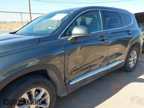 2019 Hyundai Santa Fe SE with VIN 5NMS23AD2KH134016, listed as a IAAI auction lot 41977240 with 61,448 mi miles and . Bid and sale history available at DreamBid. Image 6.