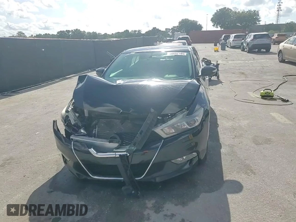 2016 Nissan Maxima SV with VIN 1N4AA6AP7GC414567, listed as a Copart auction lot 60862185 with 139,282 mi miles and Salvage title. Bid and sale history available at DreamBid. Image 14.