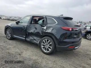 2019 Mazda CX-9 Signature with VIN JM3TCBEY8K0303259, listed as a Copart auction lot 84548154 with 70,036 mi miles and Salvage Title. Bid and sale history available at carsss.com. Image 2.