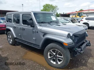 2019 Jeep Wrangler Unlimited Sahara with VIN 1C4HJXEN5KW542403, listed as a IAAI auction lot 42159197 with 60,378 mi miles and . Bid and sale history available at DreamBid. Image 1.