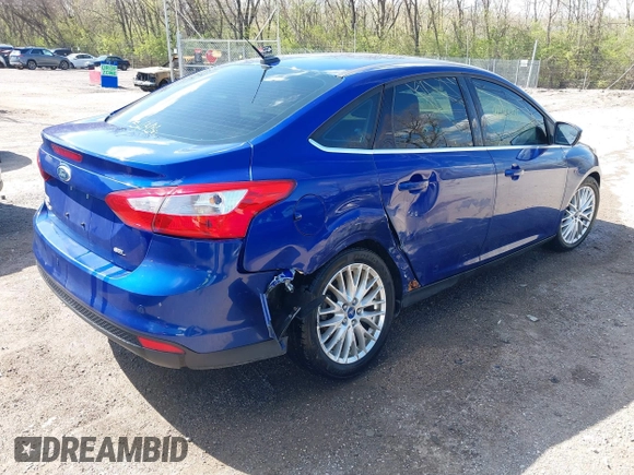 2012 Ford Focus SEL with VIN 1FAHP3H25CL283610, listed as a IAAI auction lot 41973385 with 160,732 mi miles. Bid and sale history available at carsss.com. Image 4.