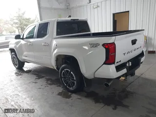 2024 Toyota Tacoma 4WD SR5 with VIN 3TMLB5JN8RM035278, listed as a IAAI auction lot 41789088 with 10,695 mi miles. Bid and sale history available at carsss.com. Image 3.