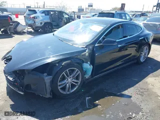 2013 Tesla Model S with VIN 5YJSA1CNXDFP05981, listed as a IAAI auction lot 41867055 with 1 miles. Bid and sale history available at carsss.com. Image 20.
