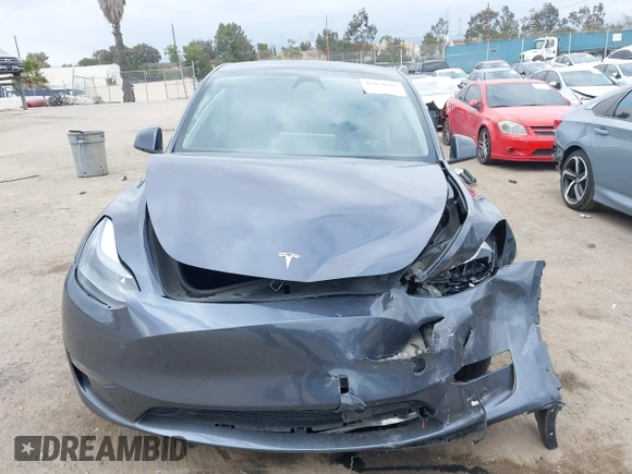 2023 Tesla Model Y Performance z VIN 7SAYGDEF1PF925274, wystawiony jako IAAI lot #42078813 z przebiegiem 20 422 mil mil oraz . Historia ofert i sprzedaży dostępna na DreamBid. Obrazek 11.