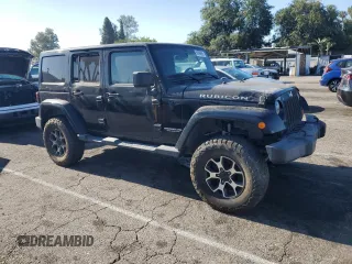 2012 Jeep Wrangler Unlimited Rubicon with VIN 1C4HJWFG9CL276753, listed as a Copart auction lot 62996995 with 234,159 mi miles and Clean title. Bid and sale history available at DreamBid. Image 4.