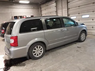 2013 Chrysler Town & Country Touring with VIN 2C4RC1BG1DR646691, listed as a IAAI auction lot 42051933 with 162,960 mi miles. Bid and sale history available at carsss.com. Image 4.