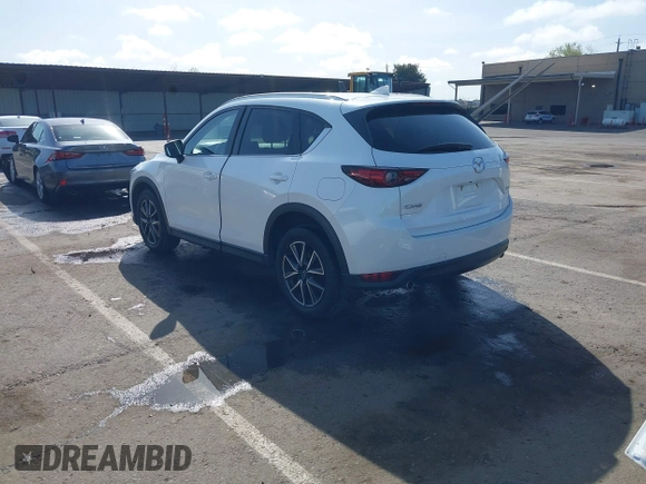 2017 Mazda CX-5 Grand Touring with VIN JM3KFADLXH0222341, listed as a IAAI auction lot 41990464 with 94,374 mi miles and . Bid and sale history available at carsss.com. Image 3.