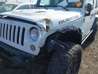 2015 Jeep Wrangler Unlimited Rubicon with VIN 1C4BJWFG1FL602412, listed as a IAAI auction lot 42065619 with 109,070 mi miles. Bid and sale history available at carsss.com. Image 6.