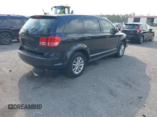 2013 Dodge Journey SE with VIN 3C4PDCAB0DT710609, listed as a IAAI auction lot 41763431 with 145,851 mi miles and . Bid and sale history available at DreamBid. Image 4.