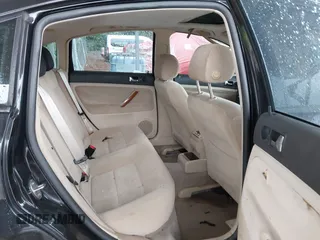 1999 Volkswagen Passat GL z VIN WVWMD63B2XE351611, wystawiony jako IAAI lot #42308007 z przebiegiem 180 893 mil mil oraz . Historia ofert i sprzedaży dostępna na DreamBid. Obrazek 8.