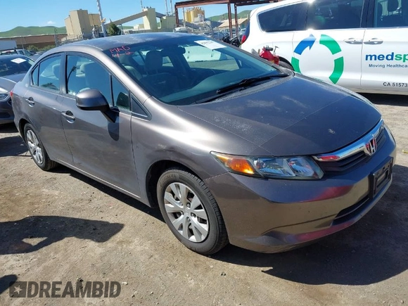 2012 Honda Civic LX z VIN 2HGFB2F58CH587746, wystawiony jako IAAI lot #41892347 z przebiegiem 138 232 mil mil oraz . Historia ofert i sprzedaży dostępna na DreamBid. Obrazek 1.