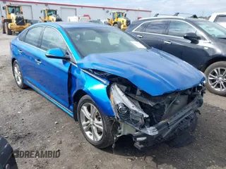 2019 Hyundai Sonata Sport z VIN 5NPE34AF2KH735382, wystawiony jako IAAI lot #41815754 z przebiegiem 136 432 mil mil oraz . Historia ofert i sprzedaży dostępna na DreamBid. Obrazek 1.