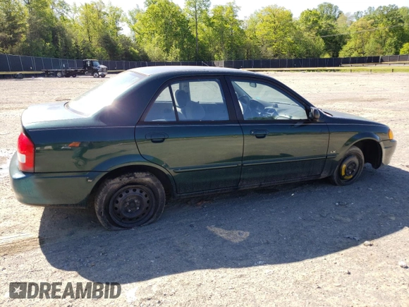 1999 Mazda Protege DX with VIN JM1BJ2223X0139775, listed as a Copart auction lot 54338455 with 63,198 mi miles and Salvage Title. Bid and sale history available at DreamBid. Image 3.