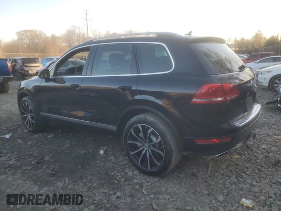2013 Volkswagen Touareg Lux with VIN WVGEF9BP1DD001025, listed as a Copart auction lot 83784314 with 205,871 mi miles and Salvage Title. Bid and sale history available at DreamBid. Image 2.