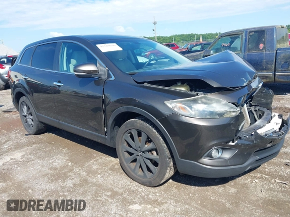 2015 Mazda CX-9 Grand Touring z VIN JM3TB3DV8F0465155, wystawiony jako IAAI lot #42366636 z przebiegiem 125 407 mil mil oraz . Historia ofert i sprzedaży dostępna na DreamBid. Obrazek 1.