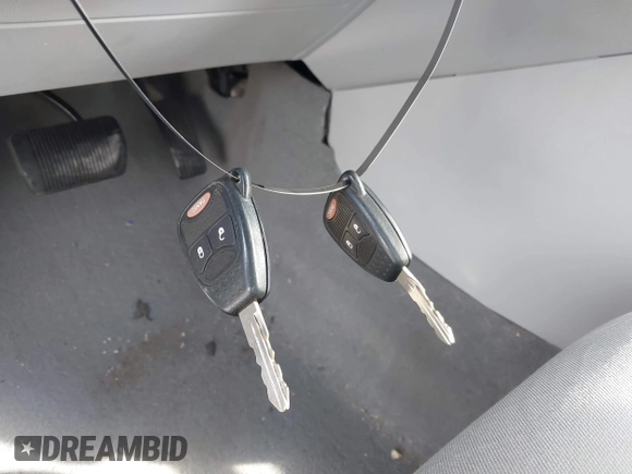 2007 Dodge Caliber SXT with VIN 1B3HB48B57D317870, listed as a IAAI auction lot 42123469 with 170,570 mi miles and . Bid and sale history available at DreamBid. Image 11.